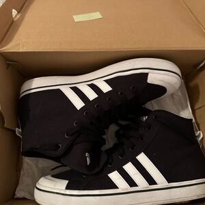 Women’s size 11 black and white mid sneaks